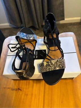 Dolce Vita Black Lace-Up Sandals with Snake-Print Strap